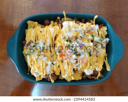 Tacos with nachos cheese topping in Mendung Cafe, Selangor, Malaysia