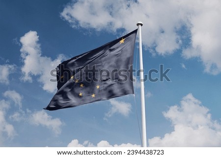 
Alaska flag waving in the beautiful sky.