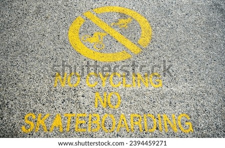 Warning sign on pedestrian zone, no cycling, no skateboarding 
