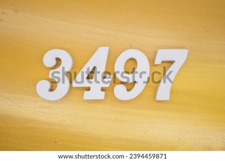 The golden yellow painted wood panel for the background, number 3497, is made from white painted wood.