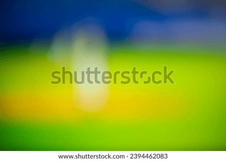 Multi-colored bokeh lights using a camera taken from an LED screen create images of different colors. blue, yellow and green different