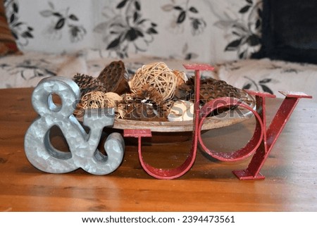 Ampersand and joy signs on a wooden table
