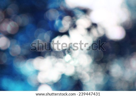 Blue bokeh from snow and lights