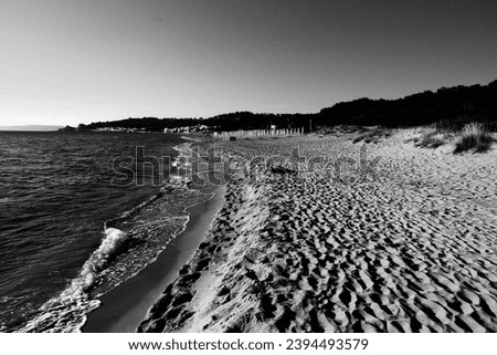 Salento beach in Italy. Lido Rivabella in Apulia region. Black and white photo retro style.