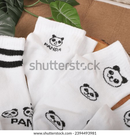 Top view white panda socks, christmas concept, pile of socks,