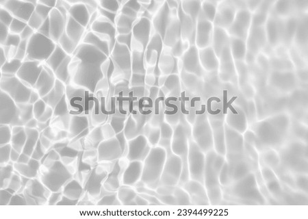 Abstract white transparent water shadow surface texture natural ripple background Royalty-Free Stock Photo #2394499225