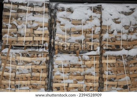 chopped birch firewood stacked on a pallet