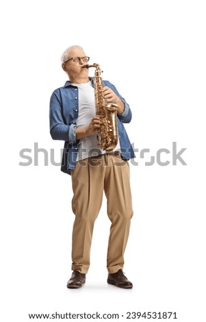 Full length shot of a casual mature man playing a saxophone isolated on white background Royalty-Free Stock Photo #2394531871