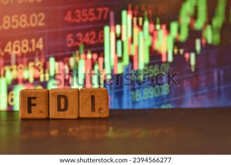 A close up picture of letters FDI . Foreign direct investment will boost up the economy.