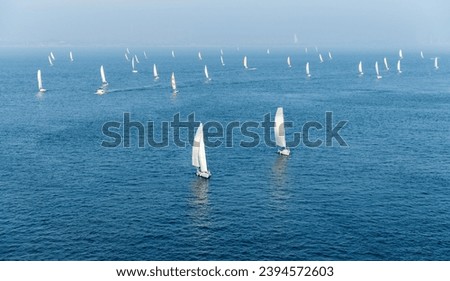 Group of sailboats in the sea. Royalty-Free Stock Photo #2394572603
