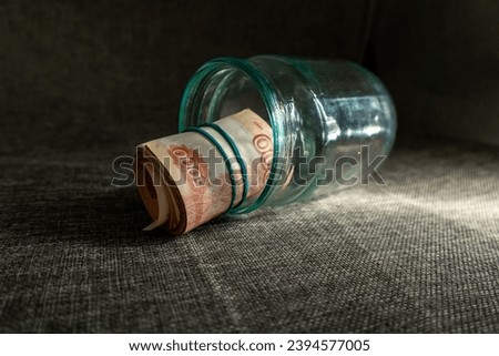 thick bundle of money, paper rubles Royalty-Free Stock Photo #2394577005