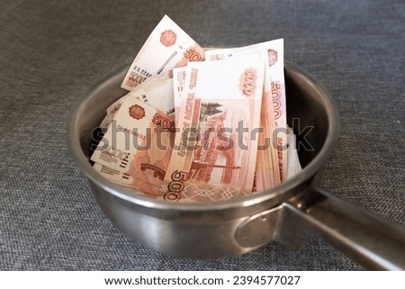 thick bundle of money, paper rubles Royalty-Free Stock Photo #2394577027