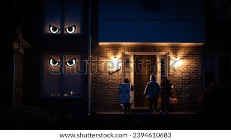 Funny Halloween house with eyes watching trick or treaters
