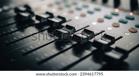 Sound control music mixer in record studio. Close up mixer and equalizer volume on the mixer amplifier. Digital audio system Royalty-Free Stock Photo #2394617795