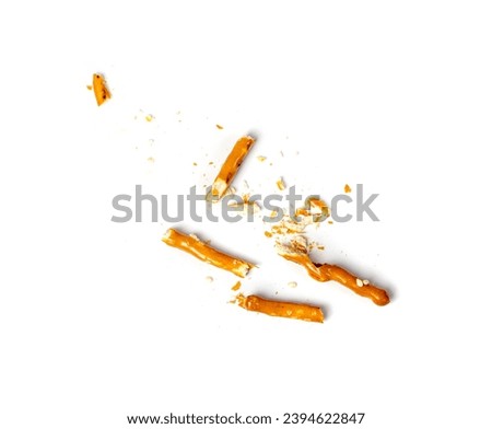 Bread Sticks Isolated, Crumbled Broken Pretzel Sticks, Straws Pieces, Sesame Grissini, Pretzels Snack with Sesame Seeds, Long Rusks on White Background Royalty-Free Stock Photo #2394622847