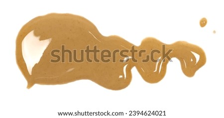 Sesame butter, paste tahini spread isolated on white, top view Royalty-Free Stock Photo #2394624021