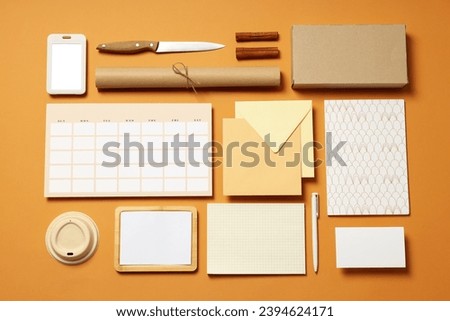 Mockup flat lay with freelancer office accessories on beige background