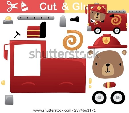 Vector illustration of cute bear cartoon on fire truck. Education paper game for kids. Cut and glue