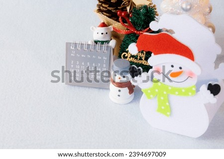 Christmas image with snowman, white bear and calendar