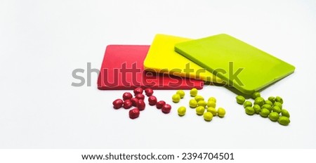 Polymer masterbatch granules with color chips isolated on a white background are suitable for banner designs for product profile photos in industrial plastic company catalogues