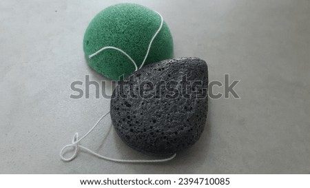 zoom out: facial cleansing sponges, simple yet effective way to achieve a radiant and revitalized complexion with gentle exfoliation. Royalty-Free Stock Photo #2394710085