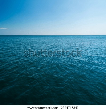 Landscape beautiful summer vertical horizon look view tropical shore open sea beach cloud clean and blue sky background calm nature ocean wave water nobody travel at  thailand chonburi sun day time Royalty-Free Stock Photo #2394715343
