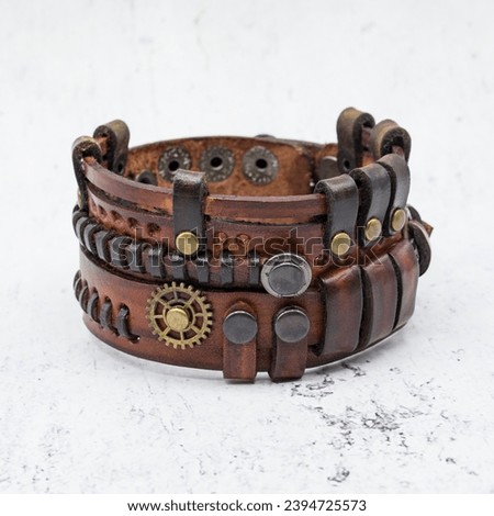 Steampunk leather bracelet. Wrist bracelet with mechanisms, rings, gears and other vintage elements. Made in Ukraine. Accessories and decorations for mtalheads, rockers, punks, bikers, goths.