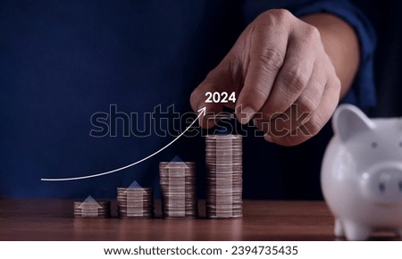 Place the silver coin on the rising line. Virtual hologram statistics Graphs and charts with up arrows stock market. Planning and growth strategies for digital marketing businesses in 2024