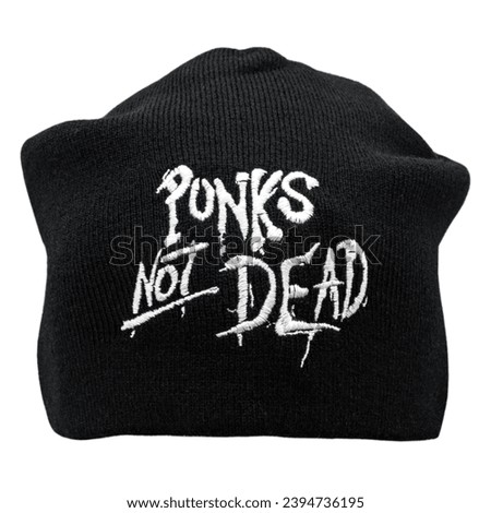 Black knitted cap with embroidered Punks not Dead inscription. Stylish accessory for parties and music festivals. Gift for rockers, punks, metalheads, bikers, goths.