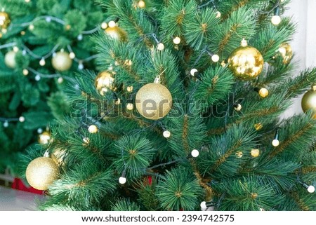 Christmas Tree with Decorations in cozy home interior,Festive image in holiday,Merry Christmas and Happy New Year.