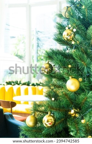 Christmas Tree with Decorations in cozy home interior,Festive image in holiday,Merry Christmas and Happy New Year.