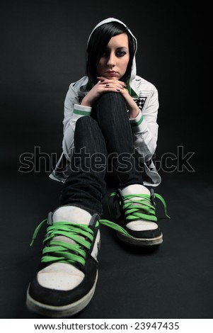 young emo girl on black background