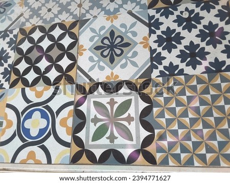 Concrete floor planted with colorful tiles