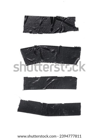 Set of pieces of general purpose vinyl black tape isolated o on white  Royalty-Free Stock Photo #2394777811