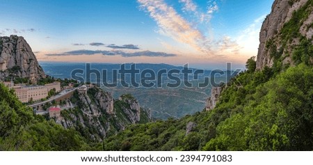 Sunset panorama view of Santa Maria de Montserrat abbey in Spain.