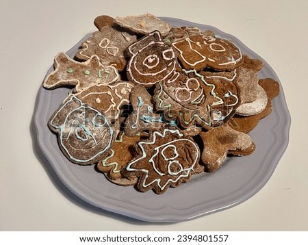 Ugly cookie with cartoon heroes Rick and Morty and Christmas traditional gingerbread man