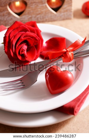 Festive table setting for Valentines Day on table background