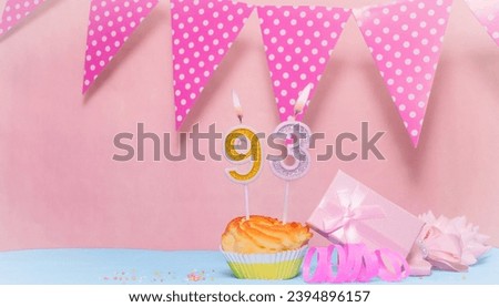 Date of Birth  93. Greeting card in pink shades. Anniversary candle numbers. Happy birthday girl, polka dot garland decoration. Copy space. Royalty-Free Stock Photo #2394896157