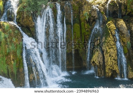 Milancev Buk waterfall at Martin Brod in Una-Sana Canton, Federation of Bosnia and Herzegovina. Located within the Una National Park, it is also known as Veliki Buk or Martinbrodski Royalty-Free Stock Photo #2394896963
