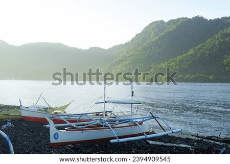 fishing boats on a shore