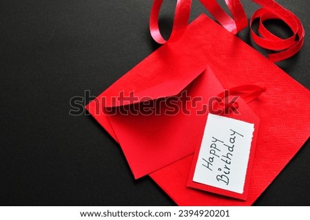 happy birthday card on the red and black backgrund 