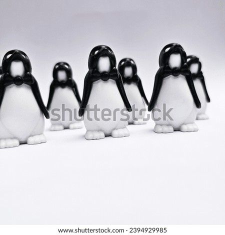 Penguin figurine isolated on white background