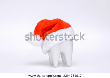 Dentist Merry Christmas And Happy New Year 2024. Concept On Blue Background With Copy Space. Dental figurines and dental instruments for Christmas and New Year.  Happy New Year to dentists