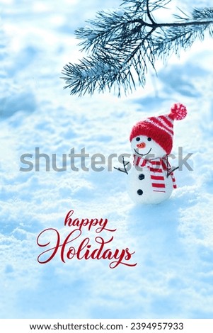 Happy Holidays greeting card. Christmas background. cute snowman and pine tree branch in snow. New Year and Christmas holidays. festive winter season. 