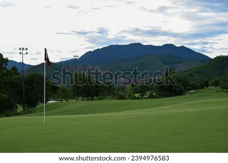 Golf course green with flag