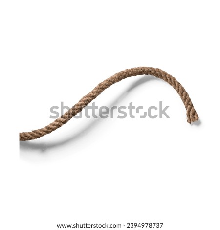 Thick rope on a black background. Royalty-Free Stock Photo #2394978737