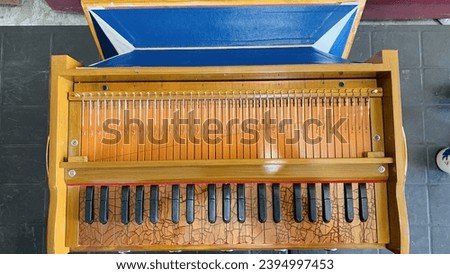 2 Line Harmonium. Traditional Indian musical organ instrument Yellow Color Harmonium which you can carry anywhere and sing with it.