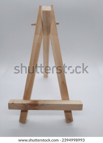Small and simple easel Isolated on white background.



