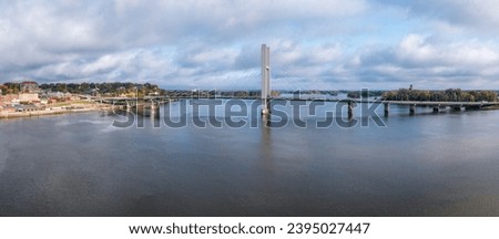 Aerial panorama of the unusual single tower cable stay Great River Bridge across Mississippi between Burlington Iowa and Illinois Royalty-Free Stock Photo #2395027447