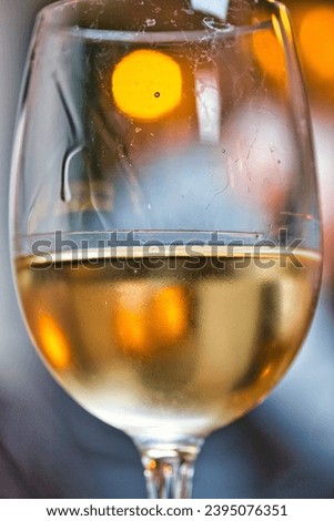 Magic picture of a glass of wine with beautiful bokeh light effect